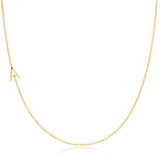 A single letter 'A' charm necklace in gold, asymmetrical in design, laid out on a white background.