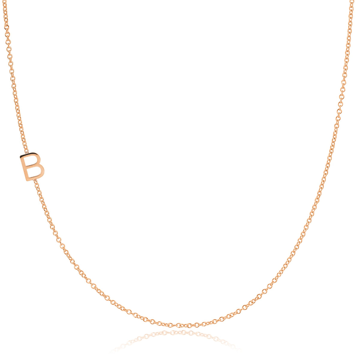 A rose gold necklace with a B letter charm on a white background.