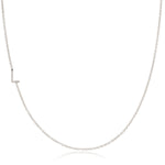 A white gold necklace with a L letter charm on a white background.