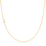 A yellow gold necklace with a pave letter J charm on a white background.