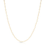 The Lily Bouquet Necklace on a white background. 