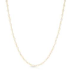 The Lily Bouquet Necklace on a white background. 