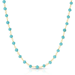 The Bluebell Bouquet Necklace on a white background. 