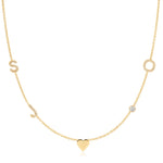 Gold necklace with a heart pendant on a white background