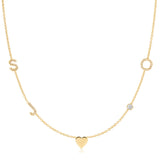 Gold necklace with a heart pendant on a white background