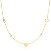 Gold necklace with a heart pendant on a white background