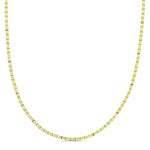 A Confetti Necklace - Green on a white background. 