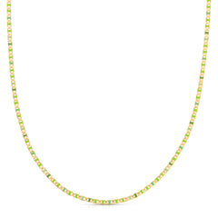 A Confetti Necklace - Green on a white background. 