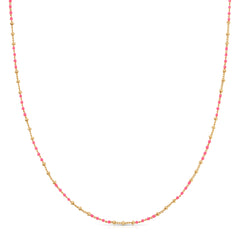 A Confetti Necklace - Pink on a white background. 