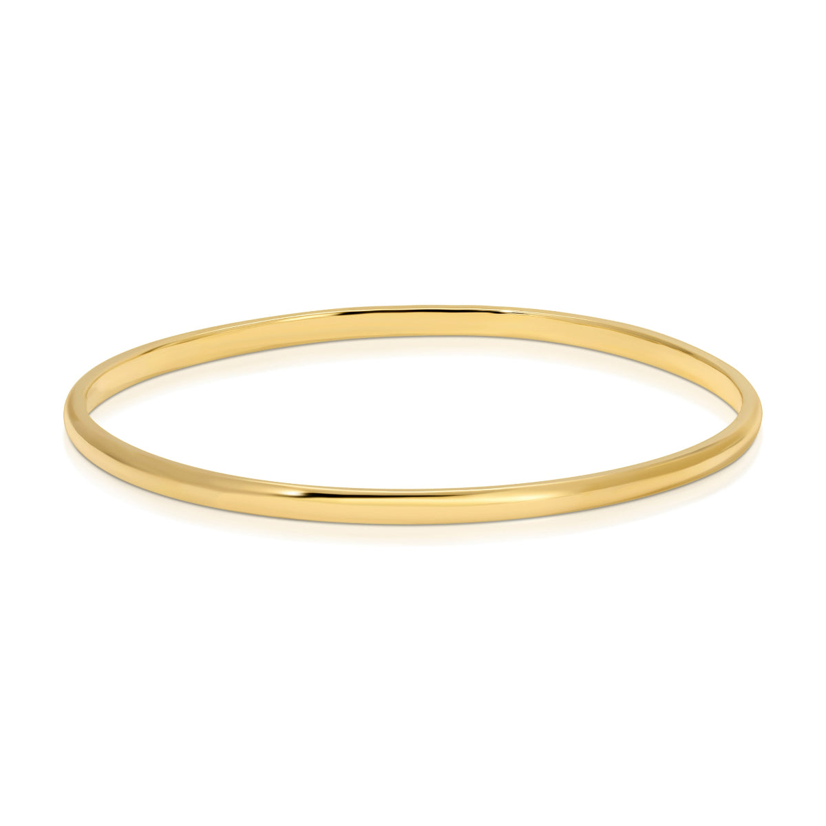A vermeil gold Flirt Bangle on a white background. 