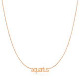 Petite Zodiac Necklace ‘aquarius’ in rose gold on a white background.