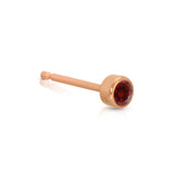 A Birthstone Stud - Garnet (January) in rose gold on a white background.