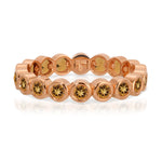 The Daisy Bouquet Ring in rose gold on a white background.