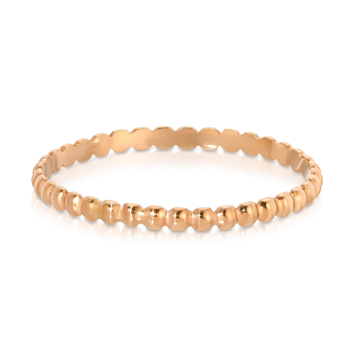 A Delicate Beaded Band in rose gold on a white background. 