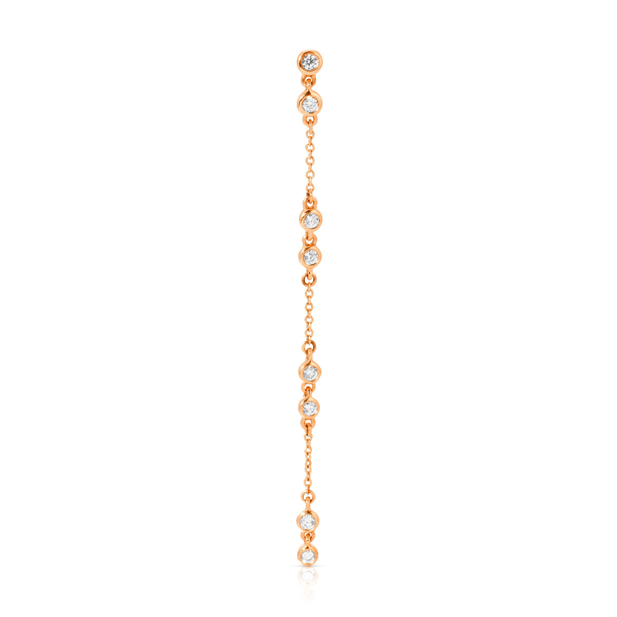 A Stardust Earring in rose gold on a white background. 