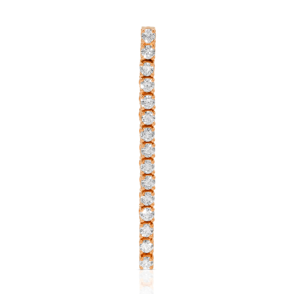A Down the Line Earring in rose gold on a white background. 