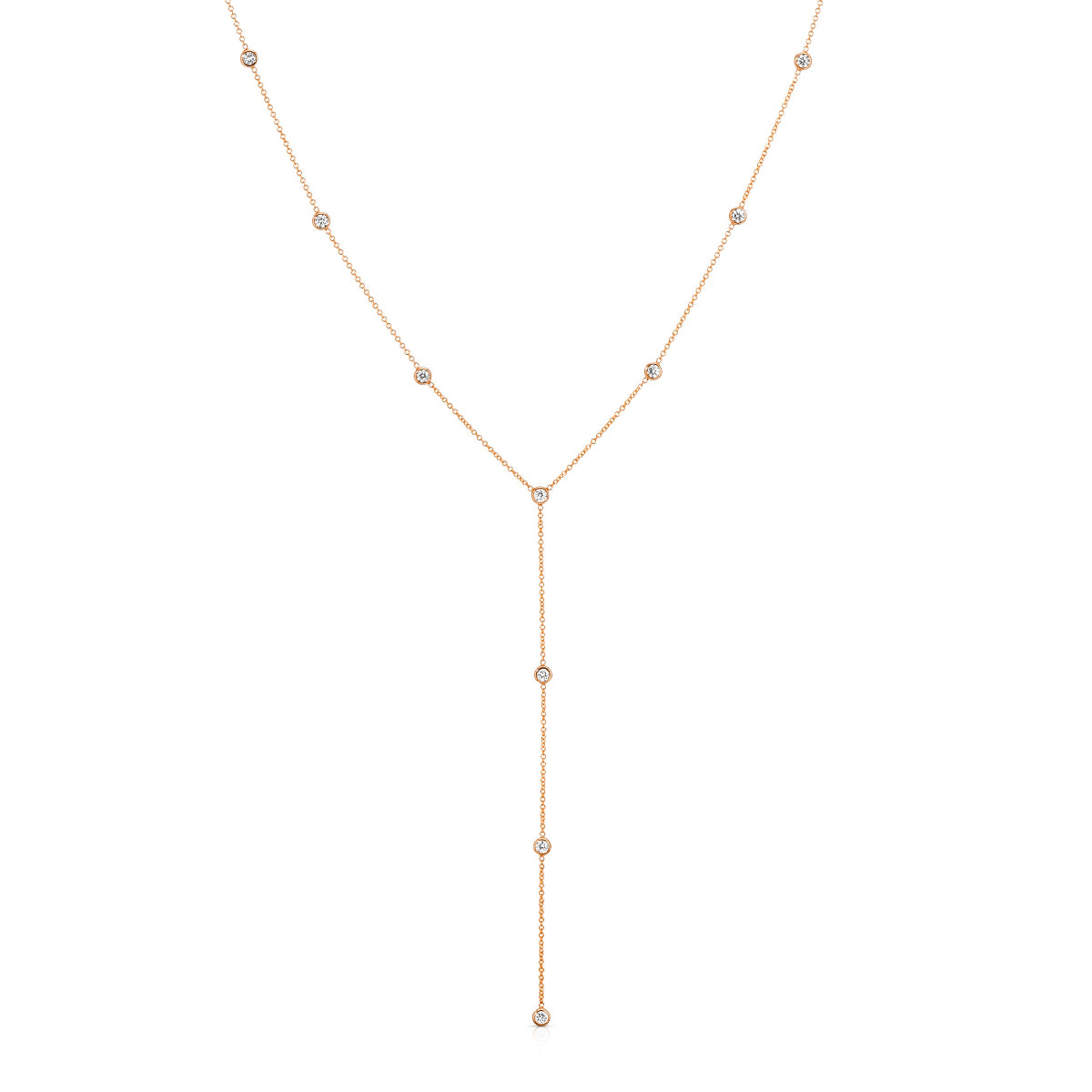 A Starstruck Diamond Lariat in rose gold on a white background. 