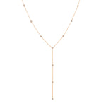 A Starstruck Diamond Lariat in rose gold on a white background. 