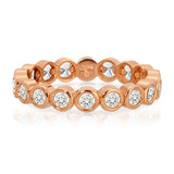 The Evermore Ring in rose gold on a white background.