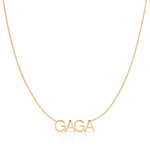 A GAGA Necklace in rose gold on a cable chain on a white background.