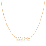 A Madre Necklace in rose gold on a cable chain on a white background.