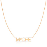 A Madre Necklace in rose gold on a cable chain on a white background.