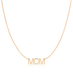 A MOM Necklace in rose gold with a cable chain on a white background. 