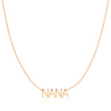 A NANA Necklace in rose gold on a cable chain on a white background.