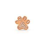 A Pavé Charm Stud - Paw in rose gold on a white background.