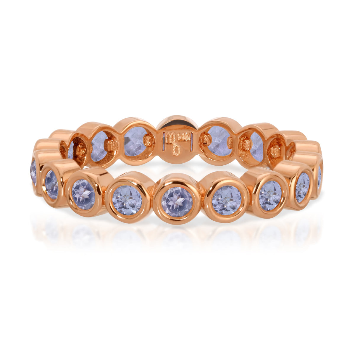 The Periwinkle Bouquet Ring in rose gold on a white background.
