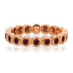 The Rose Bouquet Ring in rose gold on a white background.