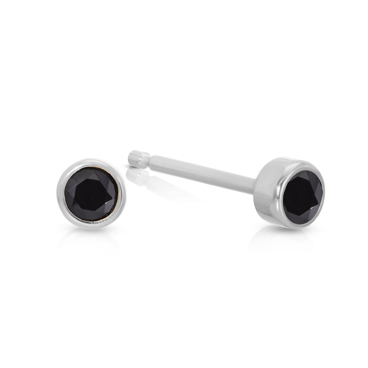 A pair of Birthstone Studs - Onyx (August) in white gold on a white background.