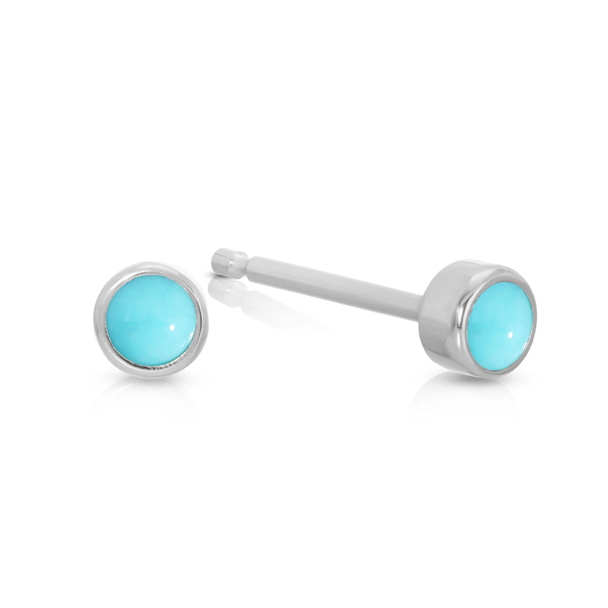 A pair of Birthstone Studs - Turquoise (December) in white gold on a white background.