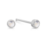A pair of Birthstone Studs - Moonstone (June) in white gold on a white background. 