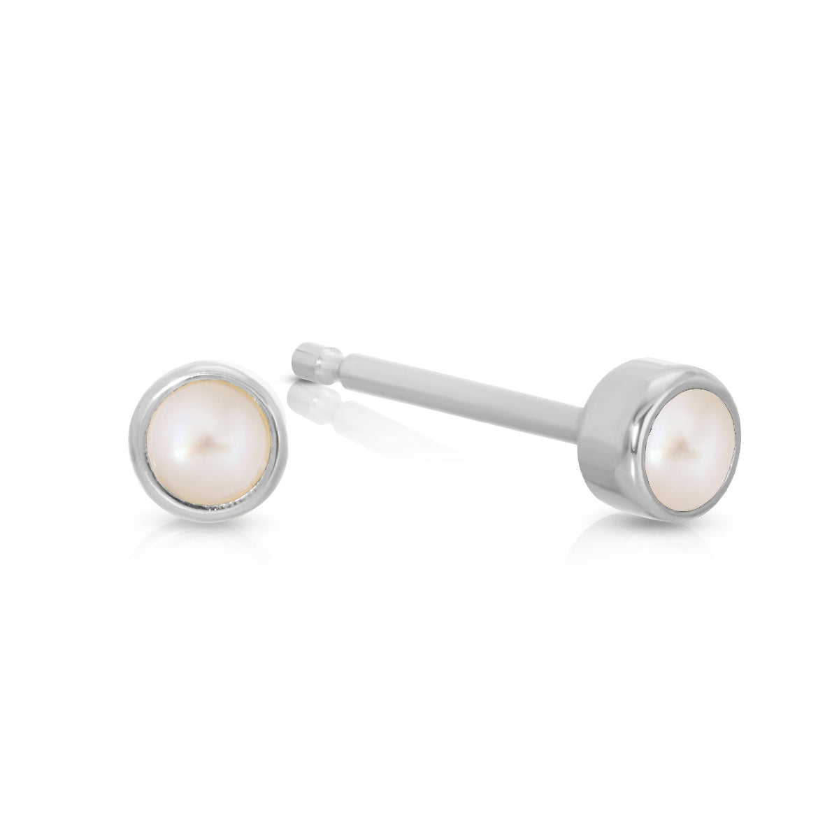 A pair of Birthstone Studs - Pearl (June) in white gold on a white background.