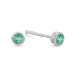 A pair of Birthstone Studs - Emerald (May) in white gold on a white background.