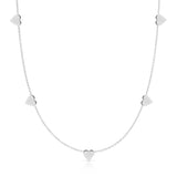 The 5 of Hearts Necklace in white gold on a white background. 