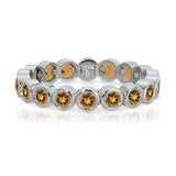 The Daisy Bouquet Ring in white gold on a white background.