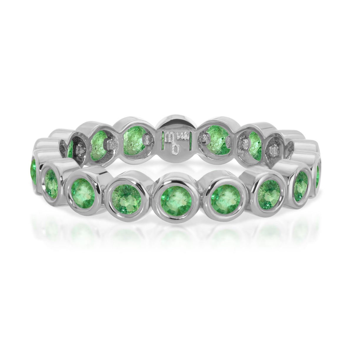 The Fern Bouquet Ring in white gold on a white background. 