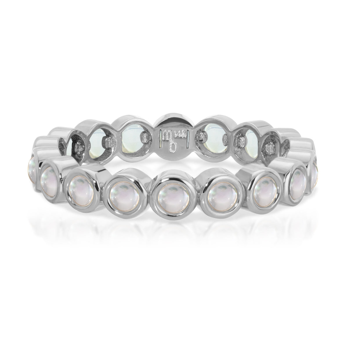 The Gardenia Bouquet Ring in white gold on a white background.