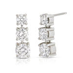 A pair of Triple Sec Diamond Earrings in white gold on a white background. 
