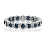 The Iris Bouquet Ring in white gold on a white background.