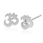 A pair of Charm Studs - Om in white gold on a white background.