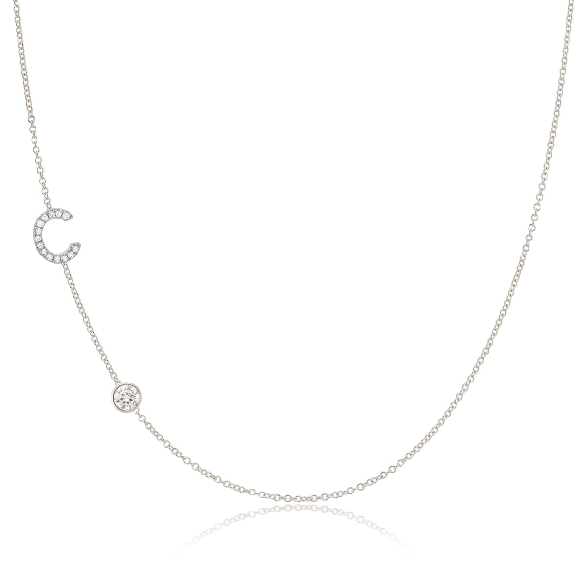 A Pavé Monogram Necklace with Diamond  and a letter C charm in white gold on a white background.