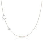 A Pavé Monogram Necklace with Diamond  and a letter C charm in white gold on a white background.