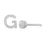 A Pavé Monogram Earring Set in the letter G in white gold on a white background.