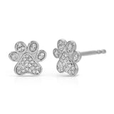 A pair of Pavé Charm Studs - Paw in white gold on a white background.