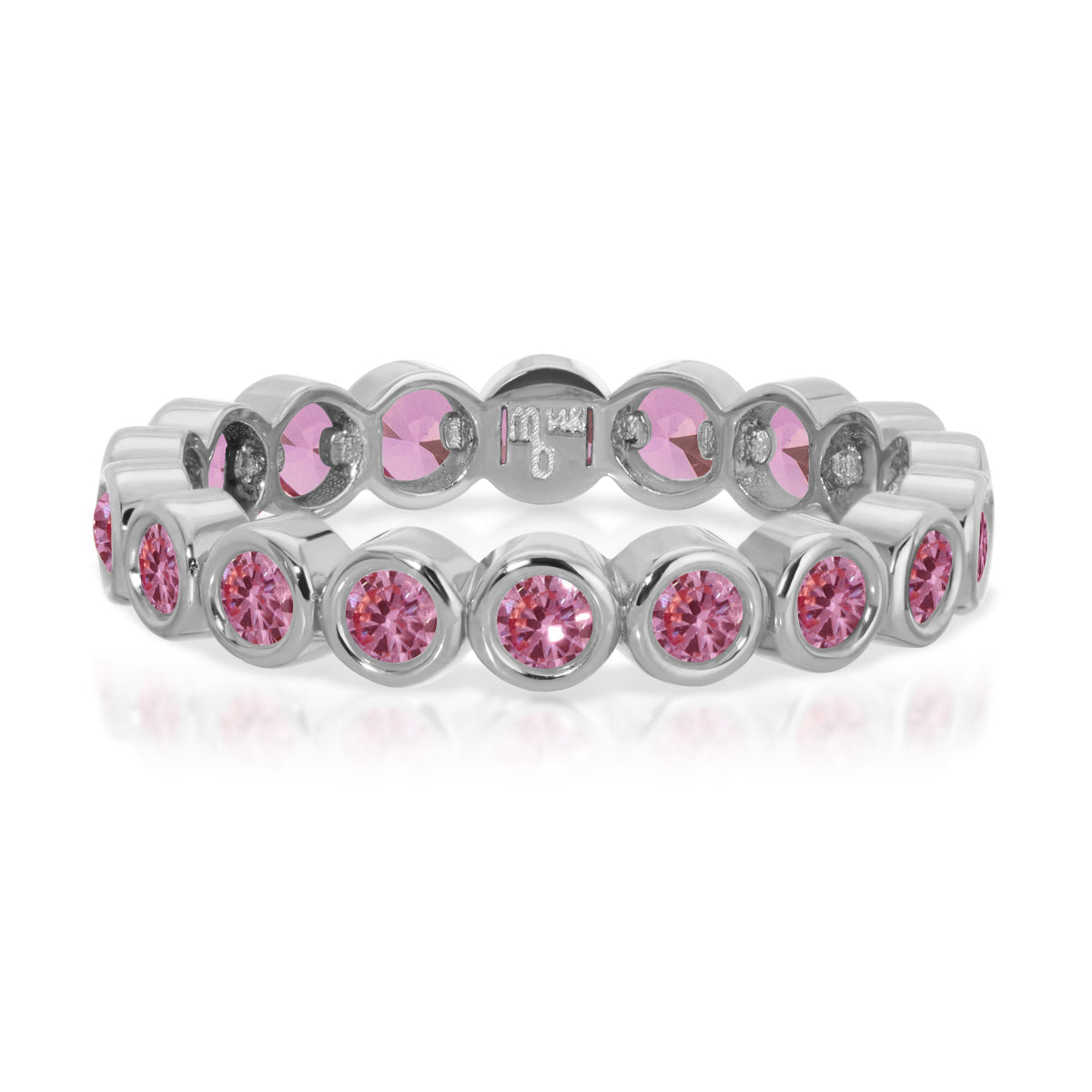 The Peony Bouquet Ring in white gold on a white background. 