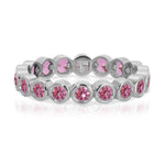 The Peony Bouquet Ring in white gold on a white background. 