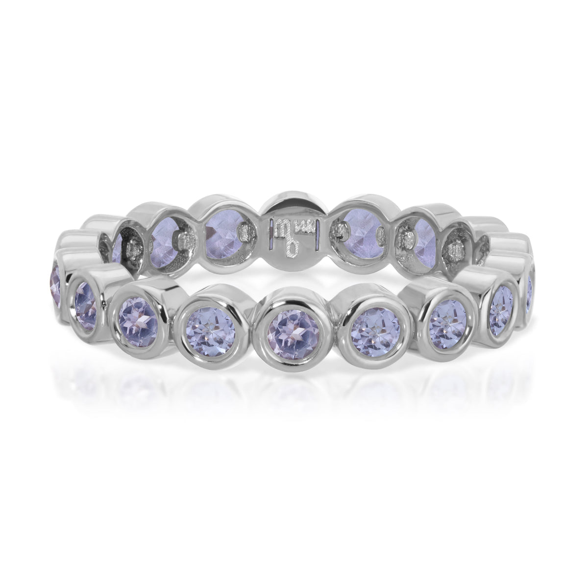 The Periwinkle Bouquet Ring in white gold on a white background.